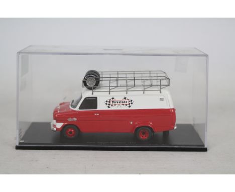 Spark - A boxed die-cast red and white coloured #S0275 Ford Transit Firestone 1972. Model appears in good condition, although