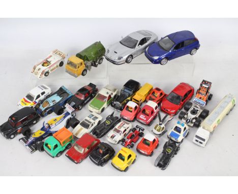 Dinky, Maisto, Corgi, Matchbox, Welly - 30 plus unboxed playworn die-cast vehicles - Lot includes a 1:24 scale Maisto Ford Fo