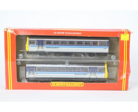 Hornby - A boxed OO gauge Class 142 Pacer Twin Railbus set in Regional Railways livery # R.103. The models appear Mint in a F