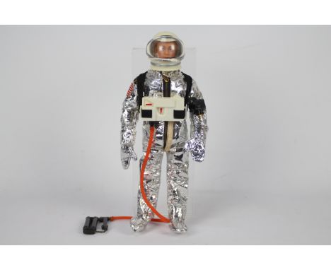 Palitoy, Action Man - A vintage painted blonde hair Action Man in Astronaut outfit. The hard hand Action Man appears to be in