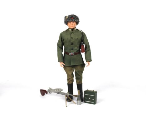 Palitoy, Action Man - A vintage Palitoy Russian Infantryman figure. The dark brown painted head figure with hard hands figure