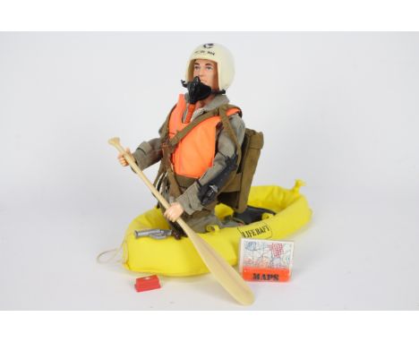 Palitoy, Action Man - A vintage unboxed blonde flock haired Action Man figure in Scramble Pilot outfit with unboxed Survival 