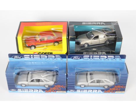 Corgi - Matchbox - 4 boxed models including 2 x Matchbox Ford Sierra XR4i models in silver # K-100, a Corgi Sierra and a Corg