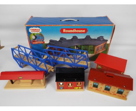 Thomas and Friends &amp; Brio - A collection of wooden track buildings and accessories. A boxed Thomas and friends wooden rou