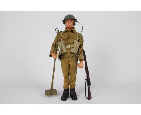 Palitoy, Action Man - A vintage Palitoy Eagle-Eye Action Man figure in Royal Engineers outfit. The blond flock haired, ''musc