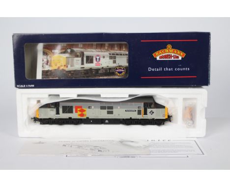 Bachmann - A OO gauge Class 37/5 Diesel loco named Tre Pol And Pen in Railfreight livery operating number 37671 # 32-380. The