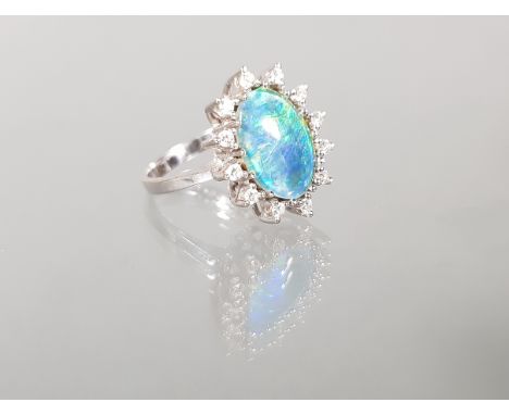 Ring, WG 585, Opal-Doublette, 12 Brillanten zus. ca. 0.24 ct., 6 g, RM 18