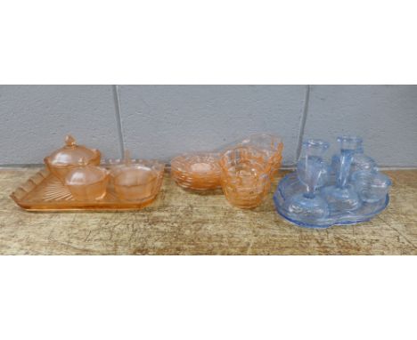 A peach glass dressing table set, six peach glass bowls and saucers and a pale blue glass dressing table set **PLEASE NOTE TH