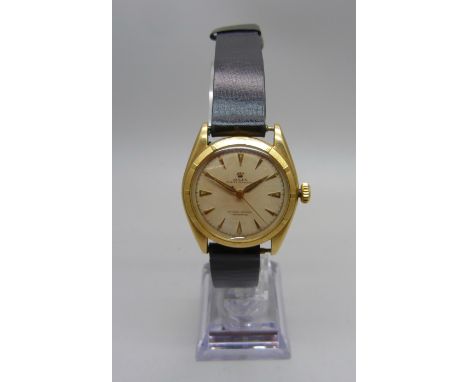 An 18ct gold cased Rolex Oyster Perpetual Officially Certified Chronometer wristwatch, bubble back case, 6085 calibre, 717606