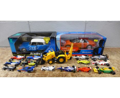 Two boxed model vehicles, Solido Citroen and a Ford Thunderbird James Bond 007 and a collection of racing cars, etc. **PLEASE