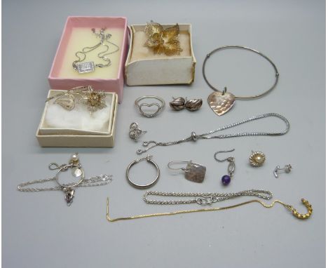 Two silver filigree brooches, three silver bracelets,  a Pandora ring (a/f), etc. 