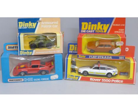 Four boxed model vehicles, Dinky 264 Rover 3500 Police car, 501 Fiat Strada and 667 Armoured Patrol Car and a Matchbox Superk