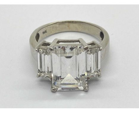 A Large Modern 14ct Gold Three Stone Dress Ring, rectangular claw set (finger size Q).