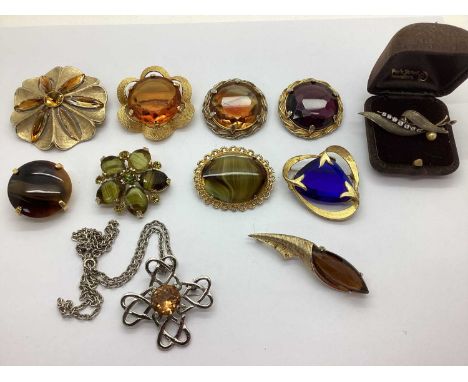 A Collection of Brooches, to include agate glass set gilt tone brooch, signed Sphinx, oversized statement design, faceted gla