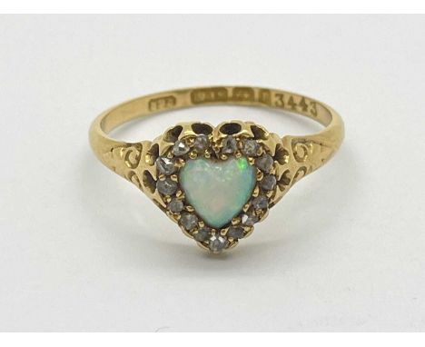A Victorian 18ct Gold Opal and Diamond Heart-Shaped Ring, (Birmingham 1898), the collet set open within an old cut diamond bo