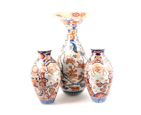 A large Imari vase, pear shaped form with a flared and crimped rim, 48cm and a pair of Imari vases, (3).