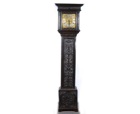 A carved oak longcase clock, 10" square brass dial, signed S Blackburn, Oakham, thirty-hour movement, striking on a bell, 198