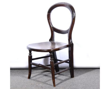 A Victorian mahogany hall chair, carved and pierced shield-shape back, serpentine seat, cabriole legs, 43cm; a beech balloon 