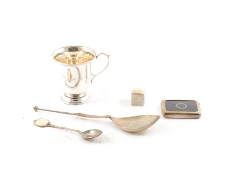 A Scottish silver gilt serving spoon, Alexander Ritchie, Glasgow 1933, Nunnery pattern, a small silver cup, engraved name to 