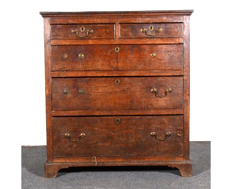 A George III walnut chest of drawers, rectangular top with a moulded edge, cross-banding and boxwood stringing, two short and