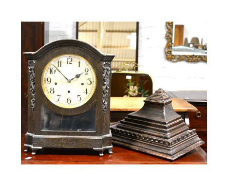 An Edwardian dark oak bracket clock, Camerer, Cuss &amp; Co., London, silvered dial, movement striking on six gongs, complete