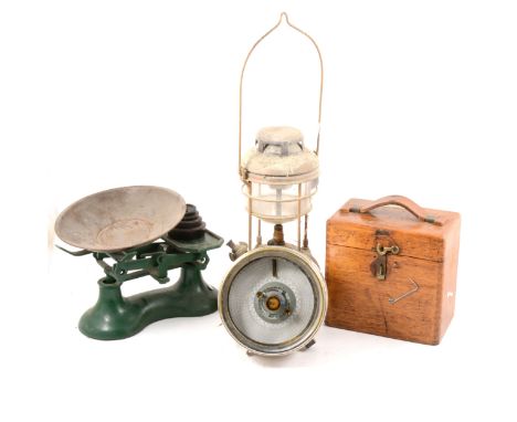 Pigeon racing clock, the oak case labelled Automatic Timing Clock Co. Bacup Blanks, a cased tilley lamp, another tilley lamp,