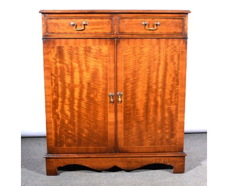 Reproduction mahogany cabinet, rectangular top with boxwood stringing, broad cross-banding, moulded edge, two drawers above a