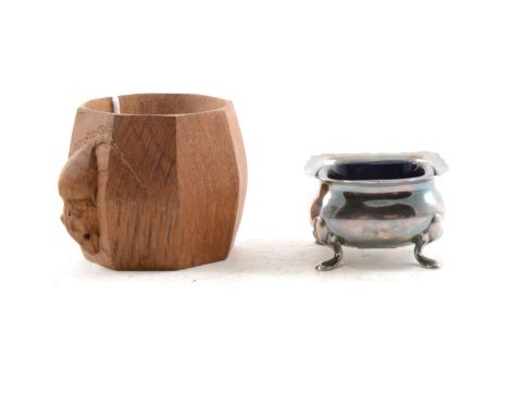 Robert " Mouseman" Thompson napkin ring, 5cm x 5.5cm, and a silver salt with spoon, blue glass liner, Birmingham 1922-3. (Qty