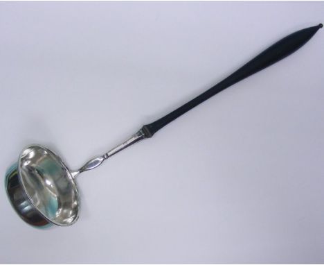 Antique Silver Ladle, Wurzburg, Germany, Circa 1780.With a tuned wooden ebonized handle.Marked.Length: 37cm / 14.56in.106gr /