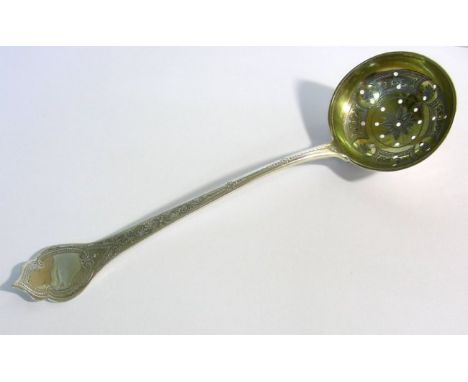 George III Sterling Silver Tea Strainer, London, England, 1806.The ladle is made with a gold washed (gilt) pierced bowl engra