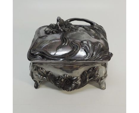 WMF Art Nouveau Pewter Jewelry Box, Germany, Circa 1900.Of rectangular form chased and relief with floral and foliate ornamen
