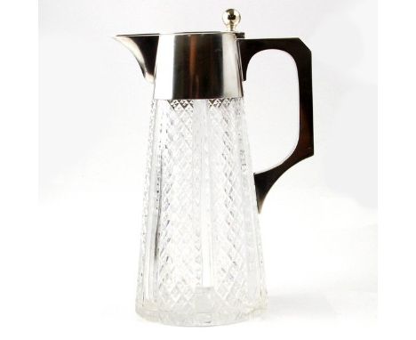Art Deco Silver Mounted Cut Crystal Claret Jug By Wilkens & Sohne, Germany, Circa 1930.Of oval tapering form, mounted silver 
