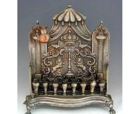 Fraget Brass & Pewter Hanukkah Lamp Menorah, Poland, Circa 1900, Judaica.The backplate is adorned with two ramping lions flan