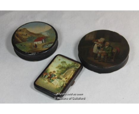 Two Victorian circular papier mache patch boxes, one with landscape view, the other with a couple 'Scotch drink', 9cm diamete