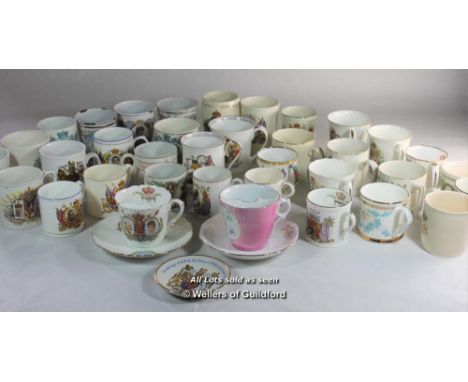 A group of commemorative wares including two enamel beakers for Victoria and one for George V, two moustache cups and saucers