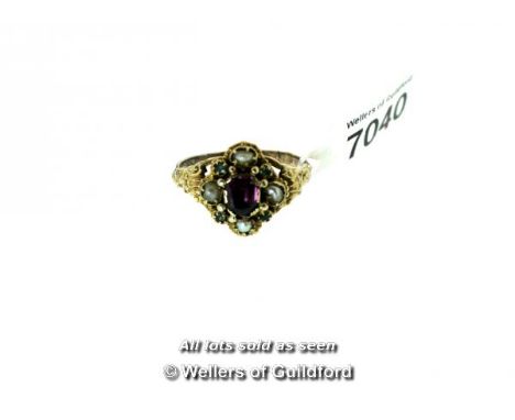 *Antique garnet, seed pearl and emerald mourning ring, mouhnted in yellow metal tested as 9ct, ring size M