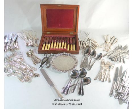 Two part suites of silver plated cutlery, one by Elkington; a pair of plated candle snuffers; a small EPNS salver; a mahogany