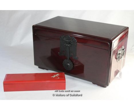 A South Korean lacquer box, hinged lid opening to reveal a lift out tray, with carrying handles, 23 x 43 x 25.5cm;  a Japanes