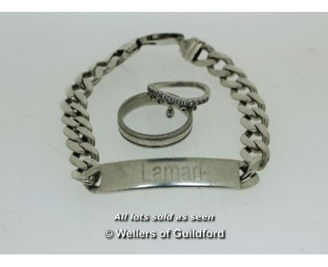*Silver identity bracelet, a Pandora ring and another silver ring, gross weight 40.5 grams (Lot subject to VAT)