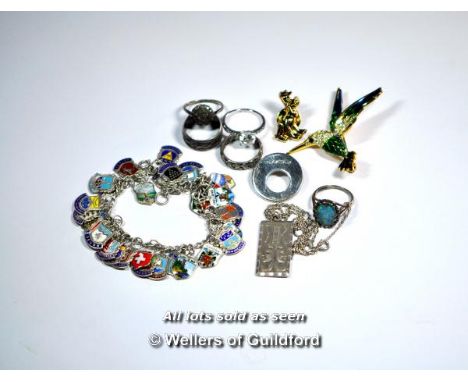 Selection of mostly silver jewellery, including a charm bracelet with country charms, gross weight 74.2 grams, and some costu