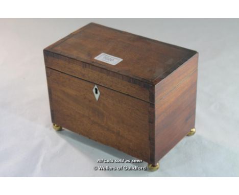 Early 19th Century crossbanded mahogany tea caddy with three divisions, 20cm wide.