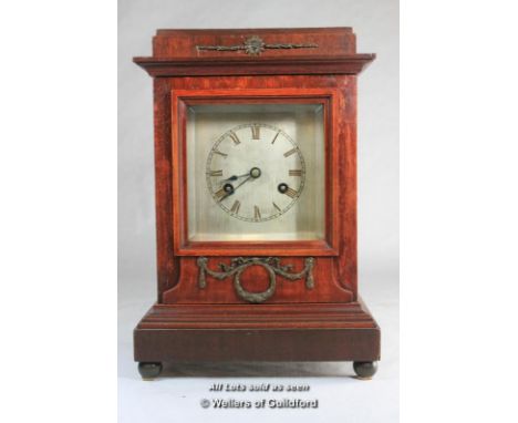 Wooden mantel clock with silvered dial, Junghans two train movement striking on a gong.