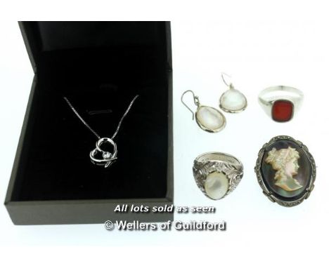 *Silver heart necklace set with a cubic zirconia, an abalone cameo brooch, a silver carnelian signet ring, a mother of pearl 