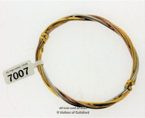 Three colour yellow metal twist hinged bangle, stamped 9ct, weight 7.2 grams
