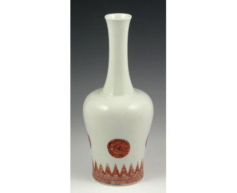 Chinese red glazed vase, porcelain, long neck Yaoling shape, decorated with round patterns on body, with Qing Kangxi mark on 