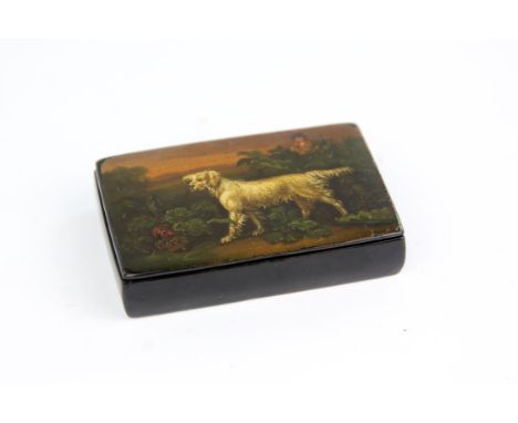 A Continental papier-mache rectangular snuff box, 19th Century, decorated to the lid with a hunter and his spaniel, with game