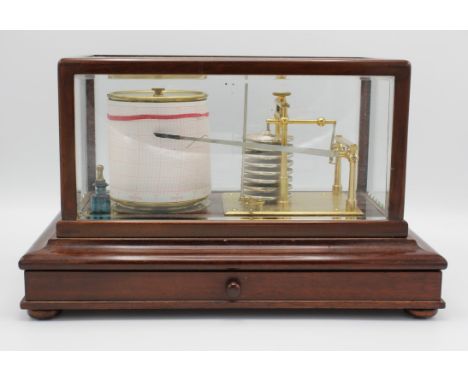 An early 20th century mahogany cased barograph in a glazed rectangular case over a base fitted with a frieze drawer.  22cm hi