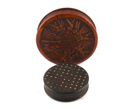 Two 19th century snuff boxes comprising ; a French burr walnut box of circular form relief carved to the lid, 8.3cm diameter 