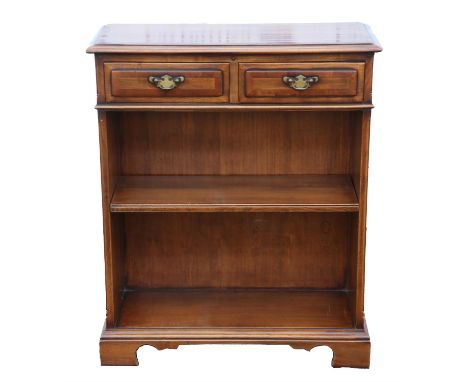 A Regency style fruitwood and yew wood banded small bookcase, by Simpson's of Norfolk, with two drawers and an adjustable she