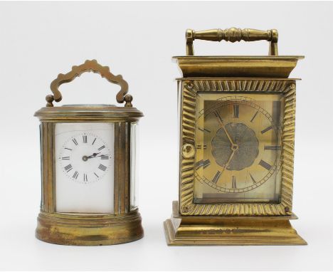 An early 20th century, miniature brass cased oval carriage clock, with white enamel dial, visible escapement and a single tra